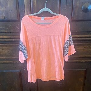 Vibrant Coral Women's Top with Leopard Print Sleeves